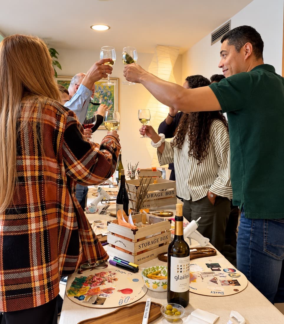 Guests raising their glasses in a toast at a Mind in Lemon celebration